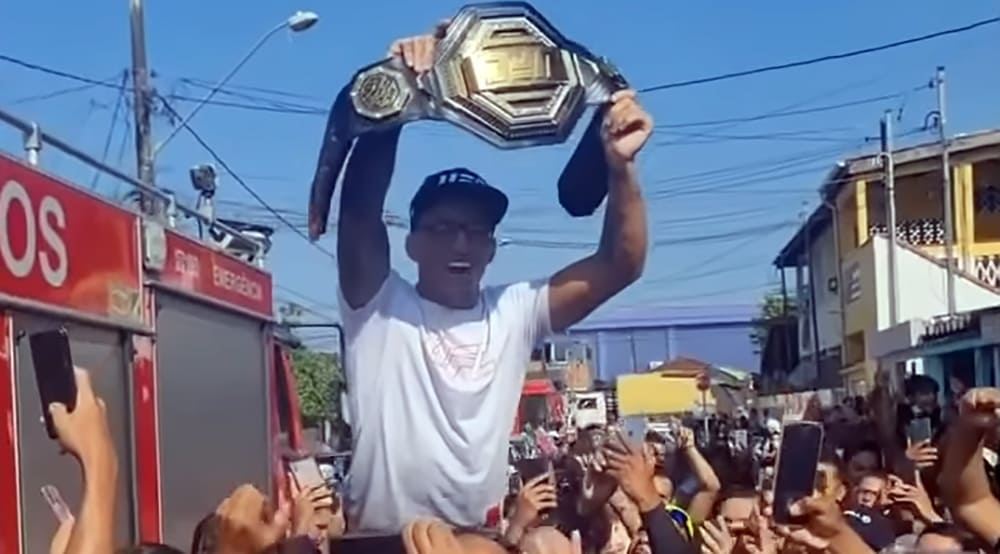 UFC champion Charles Oliveira returns to Brazilian favelas in triumph