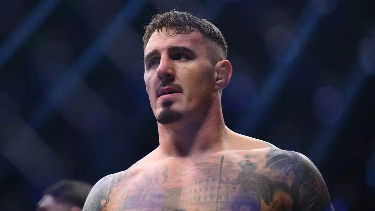 Том Аспиналл