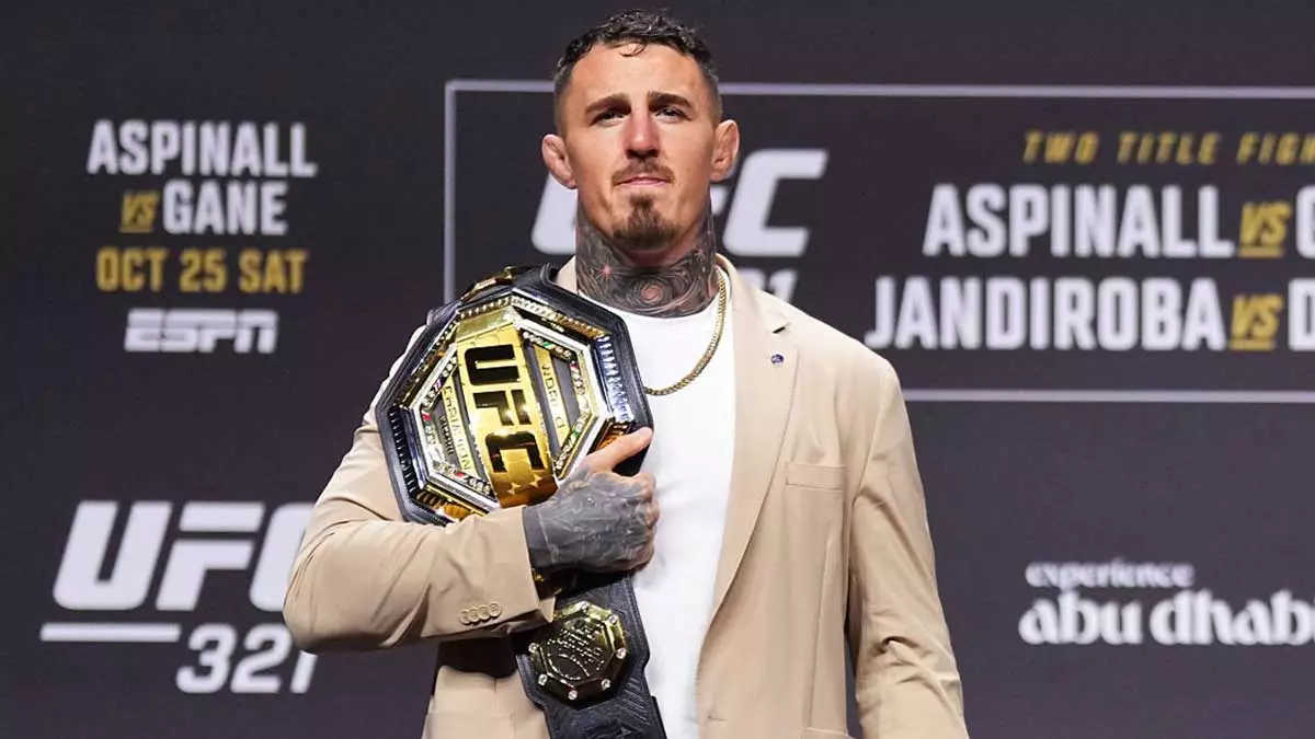 Том Аспиналл