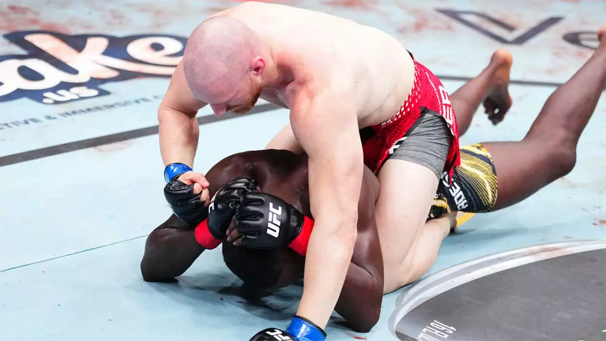 Исраэль Адесанья и Джо Пайфер