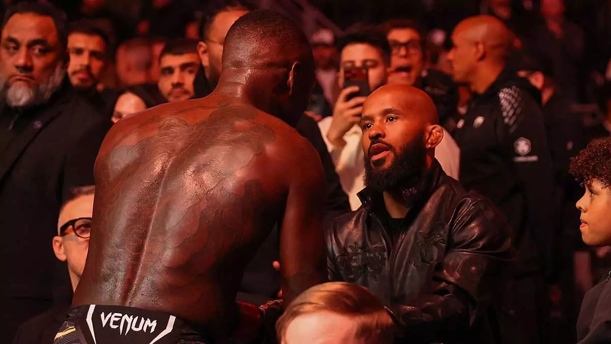 Исраэль Адесанья и Деметриус Джонсон