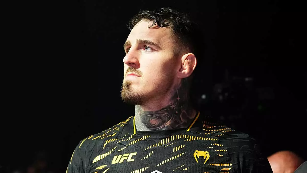 Том Аспиналл