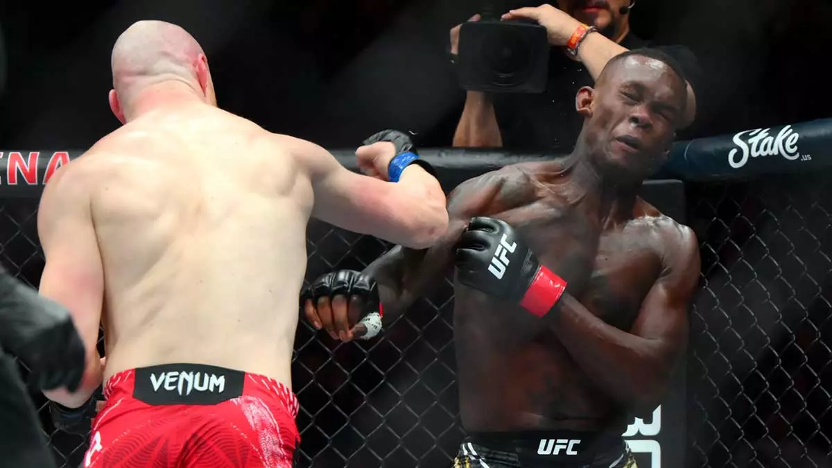 Джо Пайфер и Исраэль Адесанья